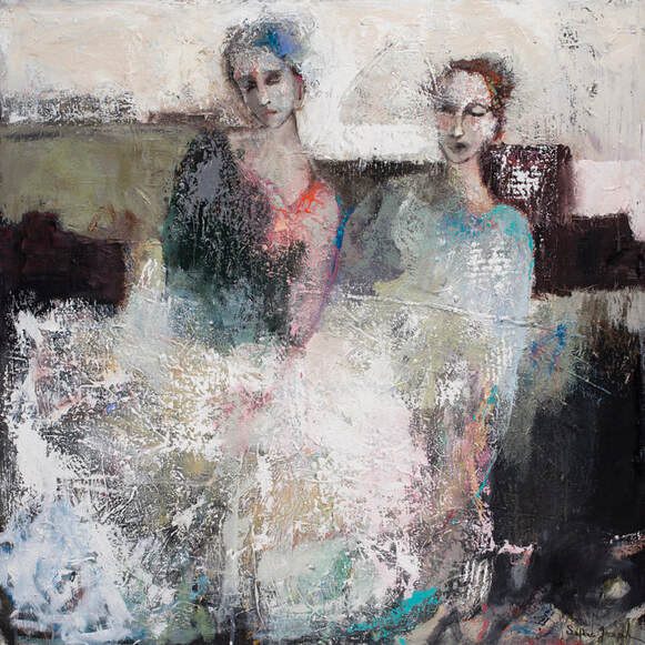 Two figures sitting together